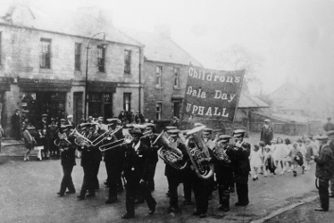 A brass band leads the procession for Uphall Children's Gala Day.