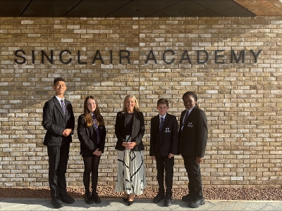 New Sinclair Headteacher Ms Jess with pupils