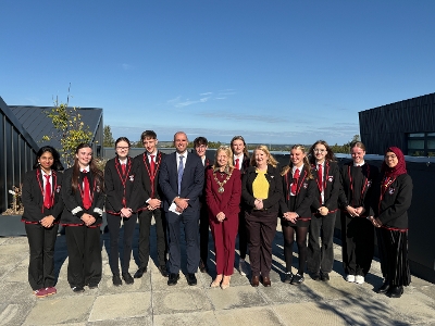 Provost Cathy Muldoon with staff and pupils on the rooftop learning area of West Calder High School