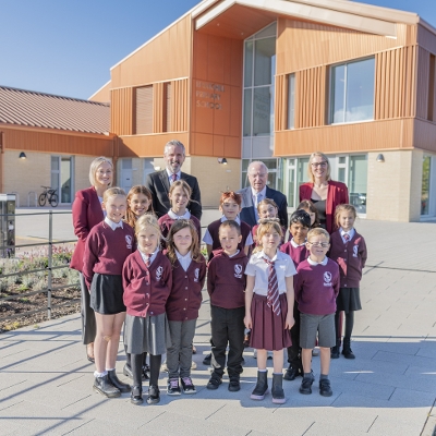 Official opening of Hawkhill Primary with council staff and Cllr Tony Boyle.