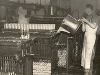 Photo of a man pouring wax into a machine at Broxburn Candle House.