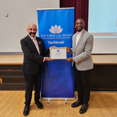Mr Kasa receives award from Vineet Lal