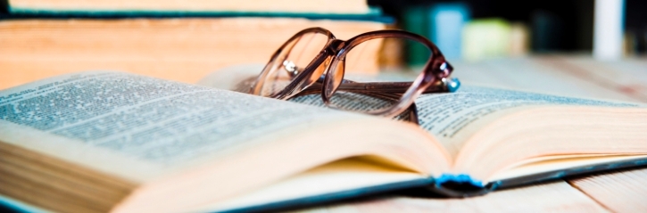 Book and reading glasses: Link to 'Broxburn Library' Book and reading glasses