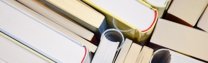 Book jigsaw: Link to 'Almondbank Library (Craigshill)' Pile of books fitting together like a jigsaw
